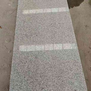 聊城芝麻白光面毛板